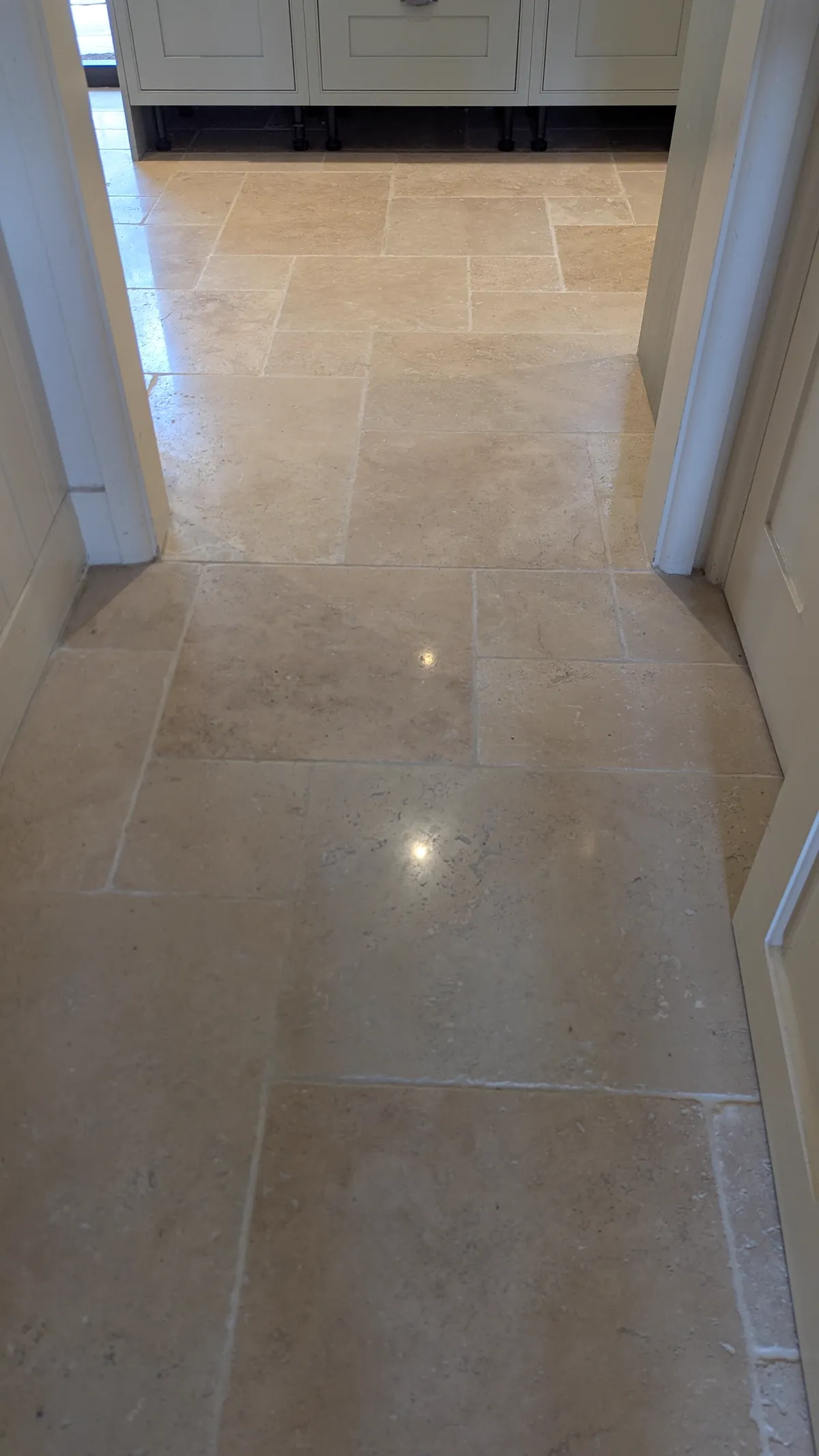 Travertine floor deep cleaned and sealed by Fresher Pressure